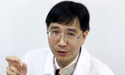 Chiński naukowiec: urzędnicy z Wuhan próbowali &quot;ukryć&quot; prawdę o COVID-19
