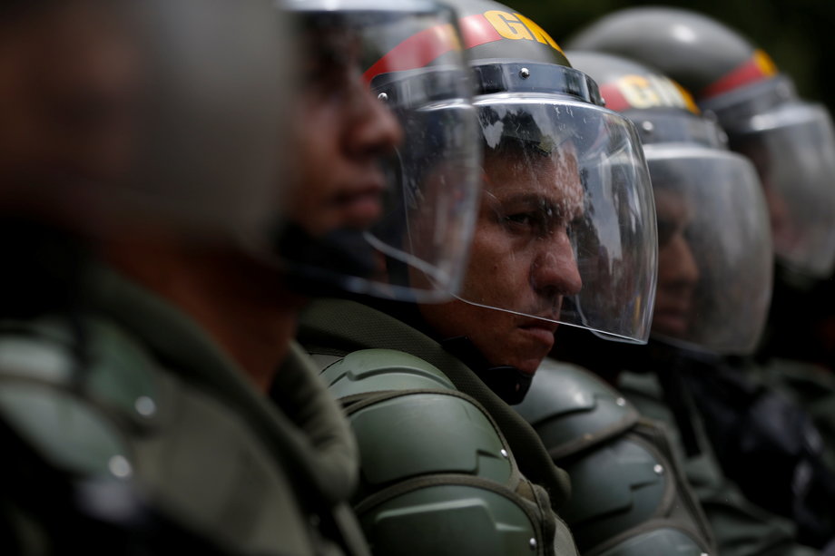 Venezuelan National Guardsmen during clashes with opposition supporters at a rally to demand a referendum to remove Maduro in Caracas, Venezuela, on May 18.