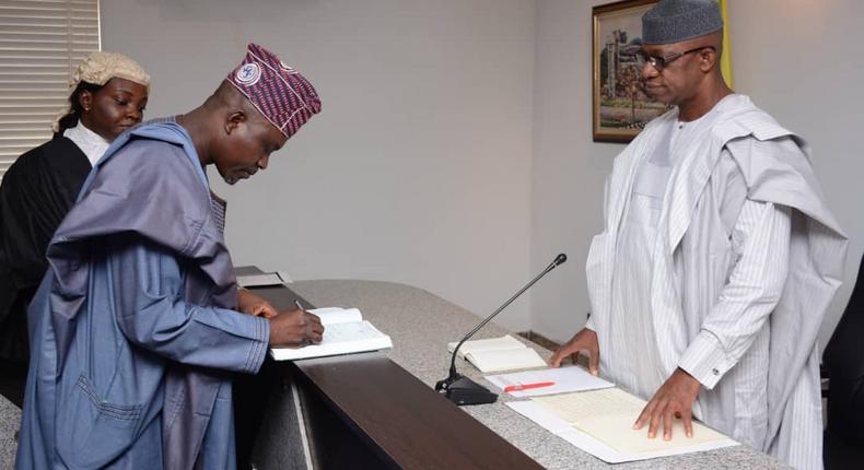 Governor Dapo Abiodun swears in Mr. Olatokunbo Talabi and Alhaji Salisu Shuaib as Secretary to the State Government and the Chief of Staff respectively. [Twitter/@@dabiodunMFR]