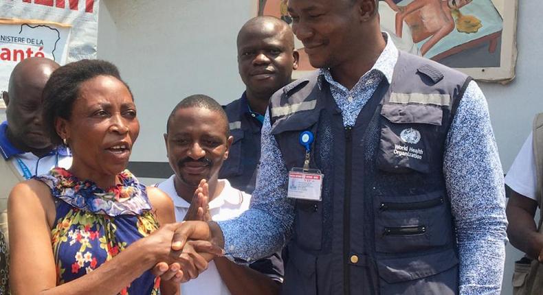 WHO Field Coordinator in Beni Dr Keïta, congratulates the last patient to leave the Ebola treatment centre, Masiko Muhaso