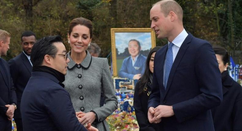 Aiyawatt Srivaddhanaprabha (left), the son of Leicester City's late chairman Vichai Srivaddhanaprabha, talks with Prince William and his wife Kate