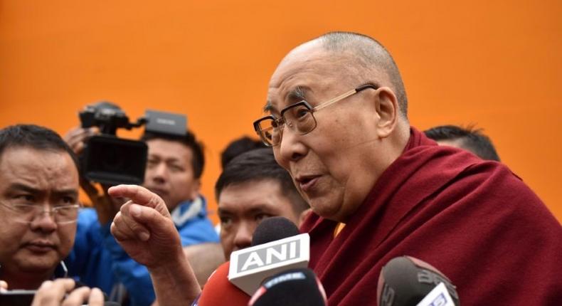 Exiled Tibetan spiritual leader the Dalai Lama speaks to media after delivering religious teachings at the Buddha Stadium in Bomdila in India's north-eastern state of Arunachal Pradesh state