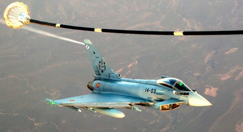 A Spanish air force Eurofighter Typhoon trails a US Marine Corps KC-130J during air-to-air refueling training near Morón air base in Spain on July 13, 2017.