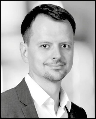 Bartosz Czerwiński adwokat i partner w EY