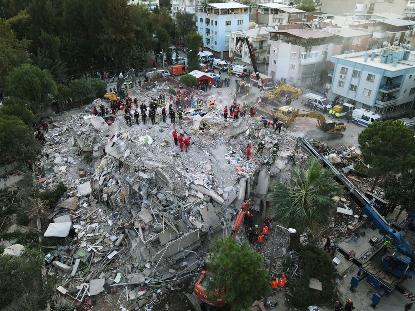 Rescue operations take place on a site after an earthquake struck the Aegean Sea, in the coastal pro