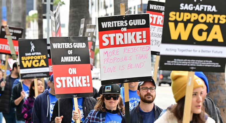 Members of two key Hollywood unions — SAG-AFTRA and the Writers Guild of America — are both on strike against Hollywood studios, networks, and streamers.FREDERIC J. BROWN/AFP via Getty Images