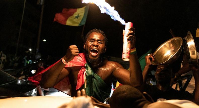 Des sénégalais envahissent les rues de Dakar pour célébrer la victoire des Lions en finale de la CAN 2021, le dimanche 6 février 2022.