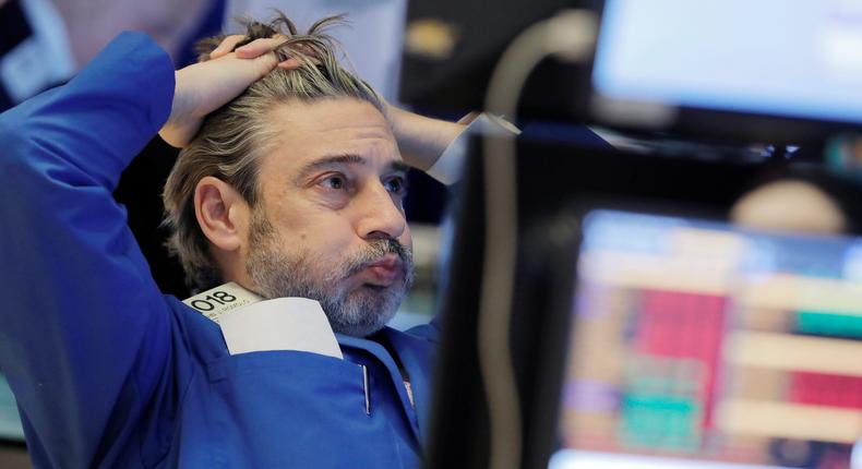 A trader works on the floor at the New York Stock Exchange (NYSE) in New York City, U.S., March 5, 2020.
