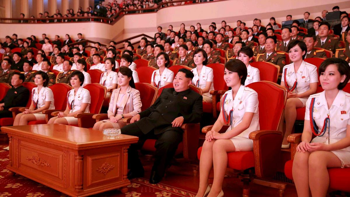 FILE PHOTO: North Korean leader Kim Jong Un and wife Ri Sol Ju enjoy an art performance given by the Chongbong Band to mark the 70th anniversary of the founding of the Workers' Party of Korea (WPK) in this undated KCNA photo