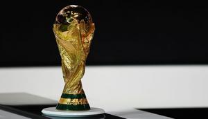 DOHA, QATAR - MARCH 31: The FIFA World Cup Trophy is pictured on display during the 72nd FIFA Congress at the Doha Exhibition and Convention Center on March 31, 2022 in Doha, Qatar. (Photo by Michael Regan - FIFA/FIFA via Getty Images)