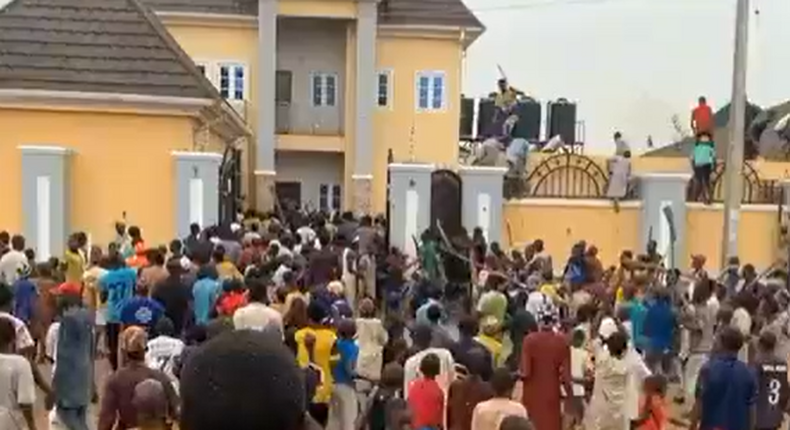 A screenshot from the viral video of an alleged attack on the property of the INEC Chairman.