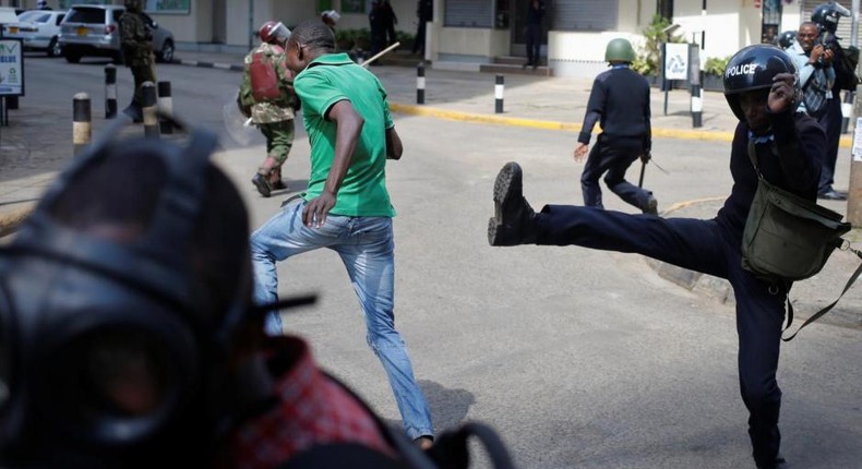 File image of protesters engaging the police in running battles. Students from Kabete Technical Training Institute stormed St Josephs ACK church and engaged the police in running battles