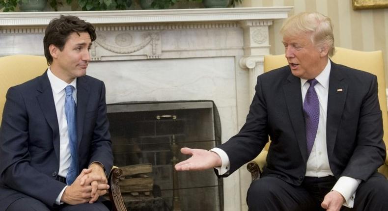 US President Donald Trump and Canadian Prime Minister Justin Trudeau meet in the Oval Office of the White House in Washington, DC, on February 13, 2017
