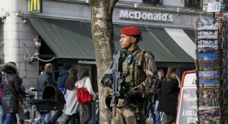 A French paratrooper patrols in the center of Lyon, France, November 27, 2015.