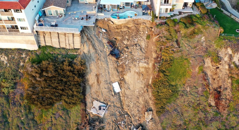 Heavy rain and landslides in California left part of a backyard ...