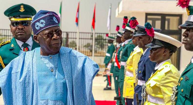 President Bola Tinubu inspects the guard of honour at the 60th anniversary of the Nigerian Defence Academy, Kaduna.  [Twitter:@NDefenceAcademy]