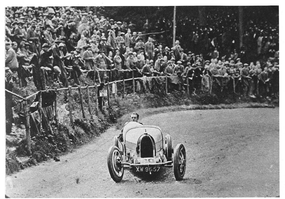 This Type 35 is incredibly well documented, and Bonhams provides an extensive history along with a good many pictures of it racing. Here, the car — a bit sideways — takes on the vaunted Shelsley Walsk Hillclimb in England in 1925.