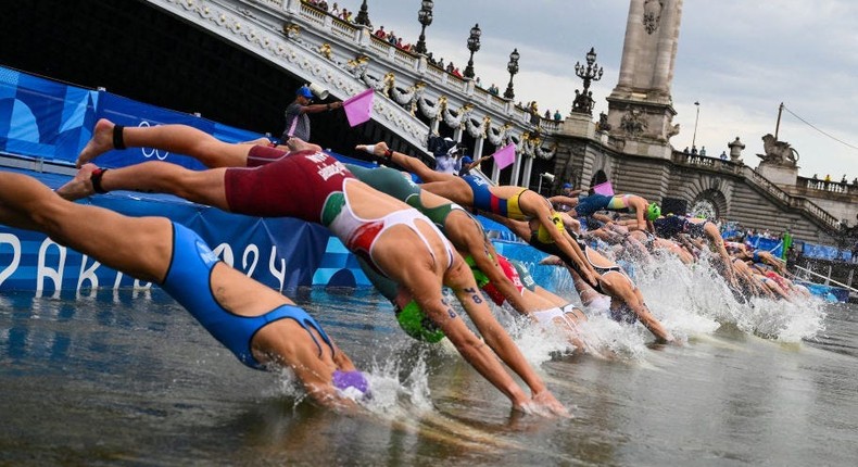 Triathletes dove into the Seine during the women's race Wednesday.JEFF PACHOUD/Getty Images