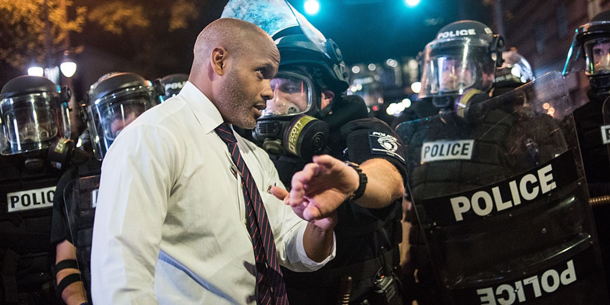 A public defender walking the streets of Charlotte has an inspirational message for the protesters — and they're listening