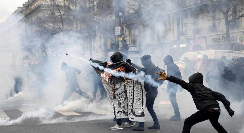 Thousands of protesters marched against police brutality in Paris, weeks after the alleged rape of a black youth with a police baton