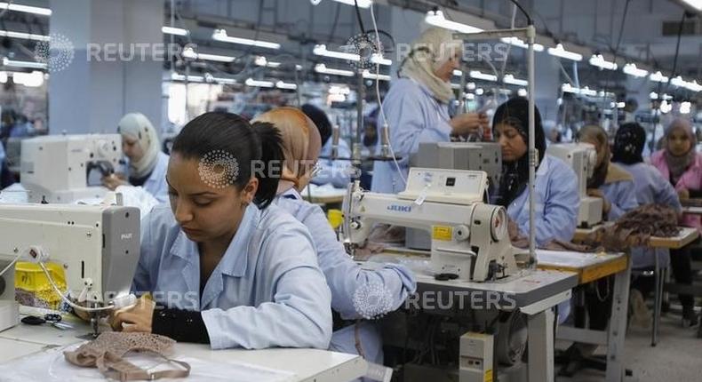 Tunisian Employees work at an underwear factory in Sfax, 260 km (162 miles) south of Tunisia March 22, 2012. REUTERS/Zoubeir Souissi