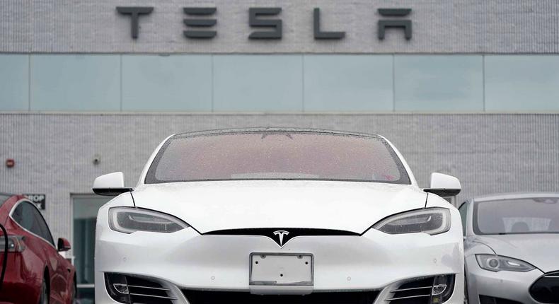A white Tesla Model S is pictured at a Tesla facility in Littleton, Colorado. AP Photo/David Zalubowski
