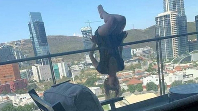 balcony yoga student mexico feet while college fell doing nigeria