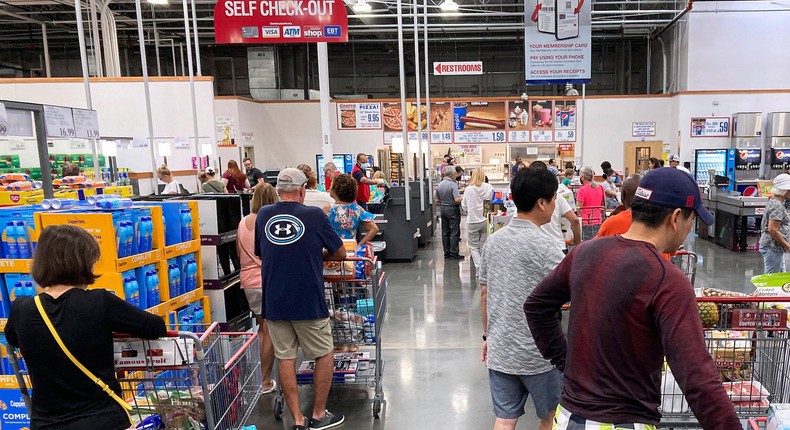 Shoppers wait in a checkout line at a Costco wholesale store in Orlando. Retailers' approach to self-checkout can have an effect on theft rates.Paul Hennessy/SOPA Images/LightRocket via Getty Images