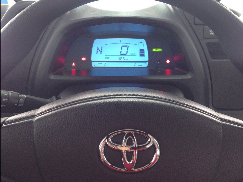 In front of the driver is a digital instrument display.