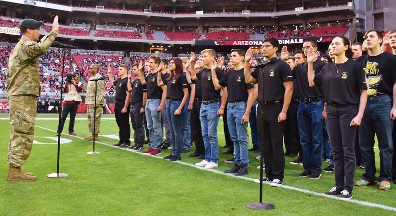 US Army oath of enlistment recruits Glendale Arizona stadium