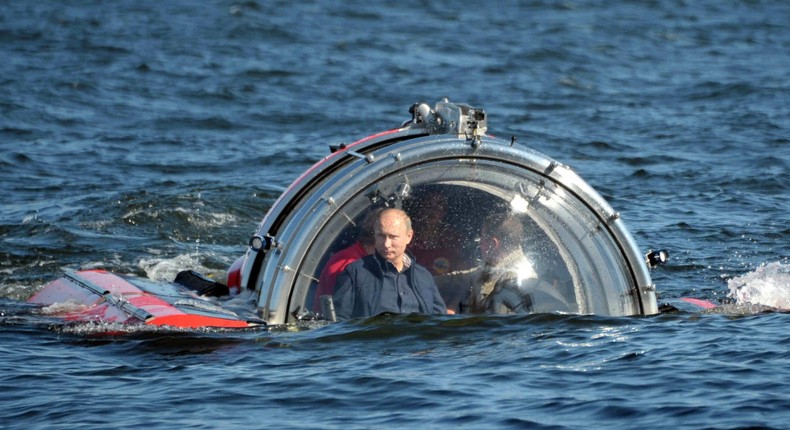 Russia's President Vladimir Putin is seen through the glass of C-Explorer 5 submersible after a dive in the Baltic Sea