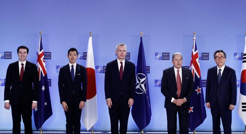 Australia's Assistant Foreign Minister Tim Watts, Japan's Vice-Minister for Foreign Affairs Kiyoto Tsuji, NATO Secretary General Jens Stoltenberg, New Zealand's Minister of Foreign Affairs Winston Peters and South Korean Foreign Minister Cho Tae-yul posing for a press photo at the NATO Foreign Affairs Ministers' meeting on April 4, 2024 in Brussels, Belgium.Kenzo Tribouillard/Pool/AFP via Getty Images