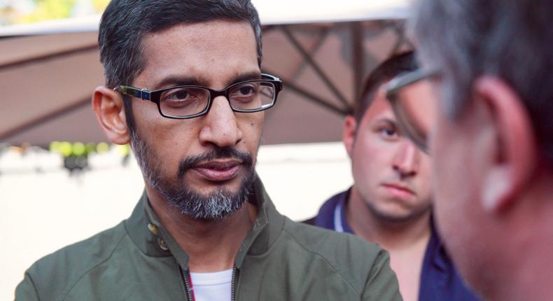 Google CEO Sundar Pichai speaks with reporters at th