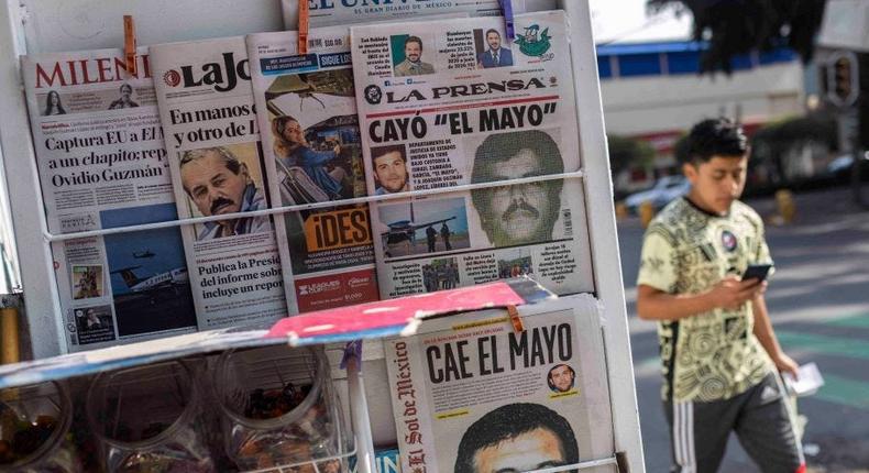 Mexican newspapers reporting El Mayo's arrest.RODRIGO OROPEZA/Getty Images