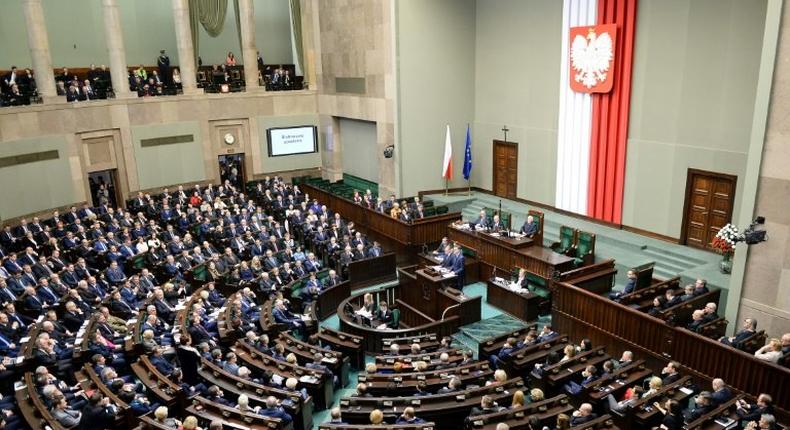Polish lawmakers attend a session of the Sejm -- the lower house of parliament -- in Warsaw