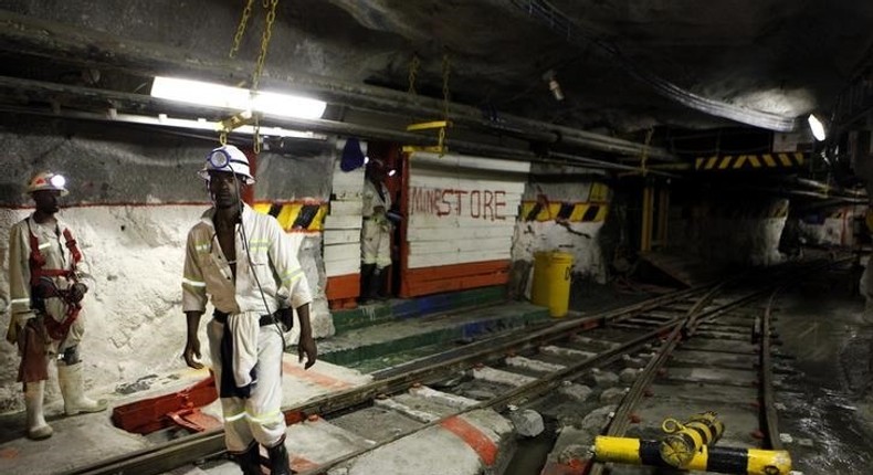 Miners are seen underground at Lonmin Plc's Karee mine in Marikana, Rustenburg 100 km (62 miles) northwest of Johannesburg, March 5, 2013. REUTERS/Siphiwe Sibeko