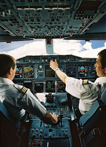 A380 cockpit. Designed in close collaboration with major airlines and in cooperation with some 60 major airports, the A380 Family starts from a baseline passenger aircraft with a capacity of 555 passengers in three classes over a range of up to 8,000nm/14,800km and is designed to cope with the growth in the airline industry. The A380 is about 35 per cent bigger than today's largest aircraft, yet it will have almost 50 per cent more floor place, providing a new way of flying when entering into service end of 2007 and will serve major hubs throughout the world. It will offer airlines an advantage of 15 to 20 per cent lower operating costs than today`s largest aircraft and will feature the unique benefits of Airbus operational communality.