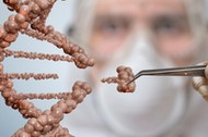 Scientist is replacing part of a DNA molecule. Genetic engineering and gene manipulation concept.