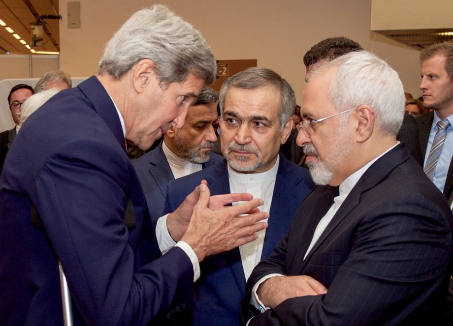 Then-US Secretary of State John Kerry with Iranian Foreign Minister Javad Zarif, right, at the Austria Center in Vienna, July 14, 2015.