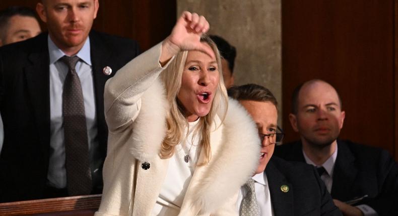 Rep. Marjorie Taylor Greene gives a thumb down as President Joe Biden delivers the State of the Union address on February 7, 2023.Jim Watson/Getty Images