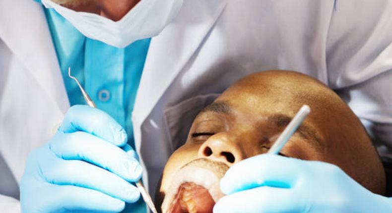 A patient being examined by a dentist