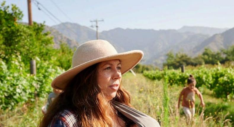 Mollie Englehart and two of her children on her former regenerative farm, Sow a Heart, in southern California.Courtesy of Sage Regenerative Kitchen & Brewery