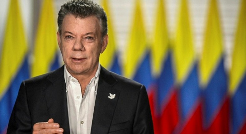 President Juan Manuel Santos says Colombia's FARC guerrillas will disarm in 20 days, rather than this week as originally planned