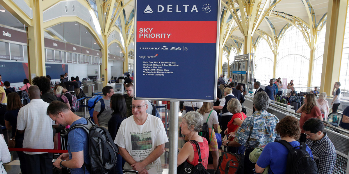 Delta passengers in line at Reagan National Airport in Washington, D.C.