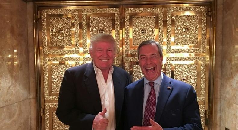 UKIP leader Nigel Farage stands with US President-elect Donald Trump during their meeting at Trump Tower in New York