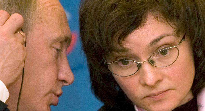 Russia's President Vladimir Putin and Russian central bank governor Elvira Nabiullina in a 2008 photo. At the time, Putin was Russia's Prime Minister and Nabiullina was the country's economy minister.Sergei Karpukhin/Reuters