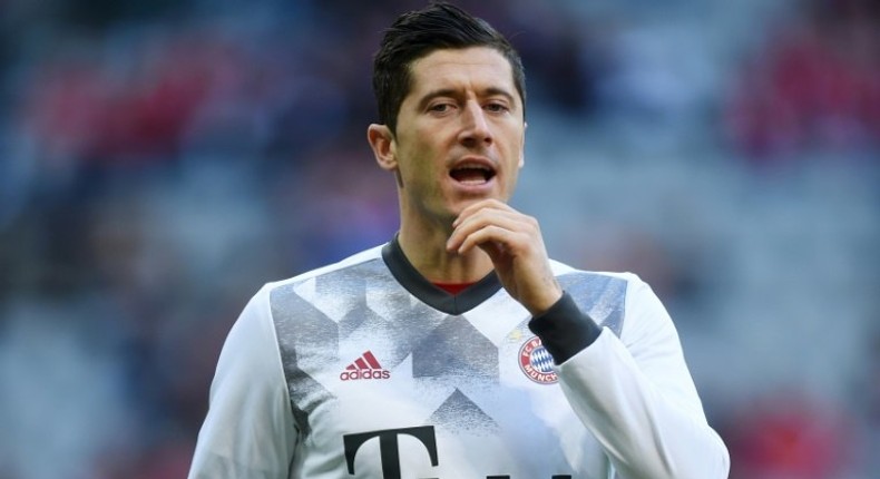 Bayern Munich's Robert Lewandowski warms up prior to their match against Wolfsburg in Munich, southern Germany, on December 10, 2016