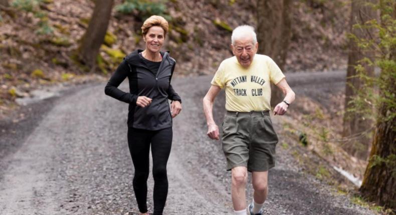 Lauren Hurst and 98-year-old runner George Etzweiler.Lauren Hurst