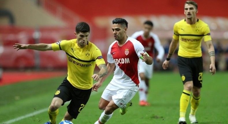 Borussia Dortmund's US midfielder Christian Pulisic (L) will not be leaving the Bundesliga leaders in the January transfer window, his club has insisted.