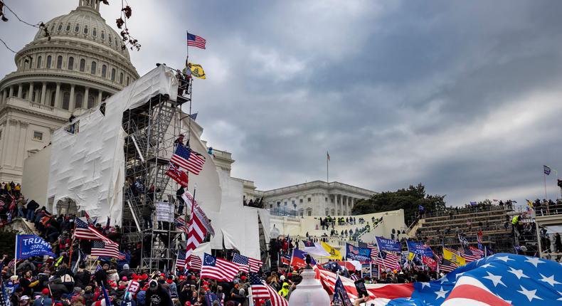 Trump supporters clash with police and security forces as people try to storm the US Capitol on January 6, 2021 in Washington, DC. Demonstrators breeched security and entered the Capitol as Congress debated the 2020 presidential election Electoral Vote Certification.